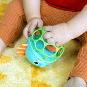 OBALL Šviečiantis muzikinis žaislas Giggle & Glow dramblys 3 m+